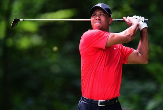 GREENSBORO, NC - AUGUST 23:  Tiger Woods tees off on the second hole during the final round of the Wyndham Championship at Sedgefield Country Club on August 23, 2015 in Greensboro, North Carolina.  (Photo by Jared C. Tilton/Getty Images)